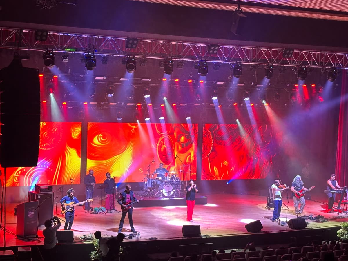 Live concert stage with lighting at Thaala Utsav