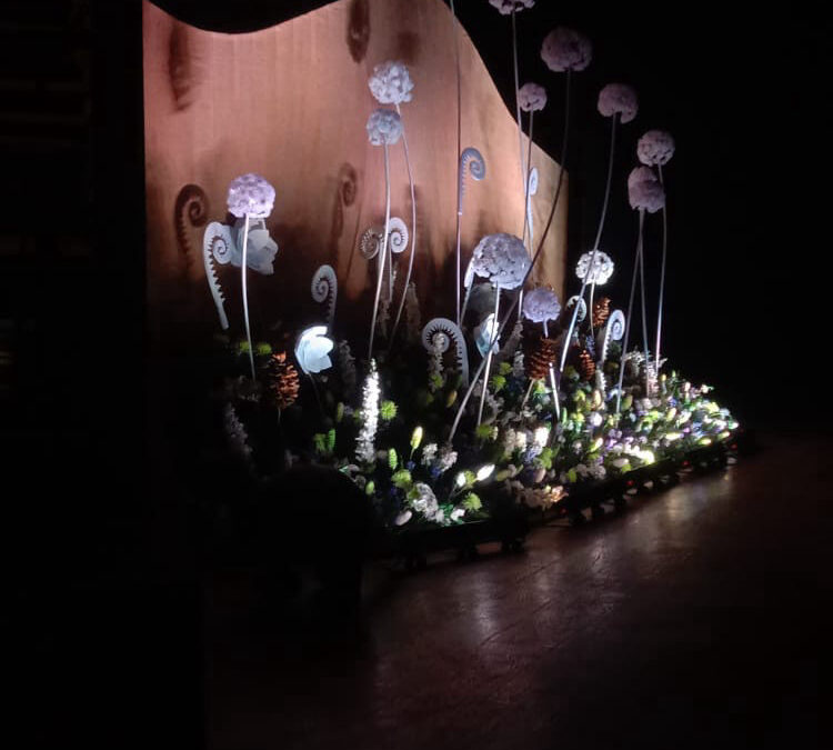 Lit floral stage installation backdrop at InvokED 4.0 education summit