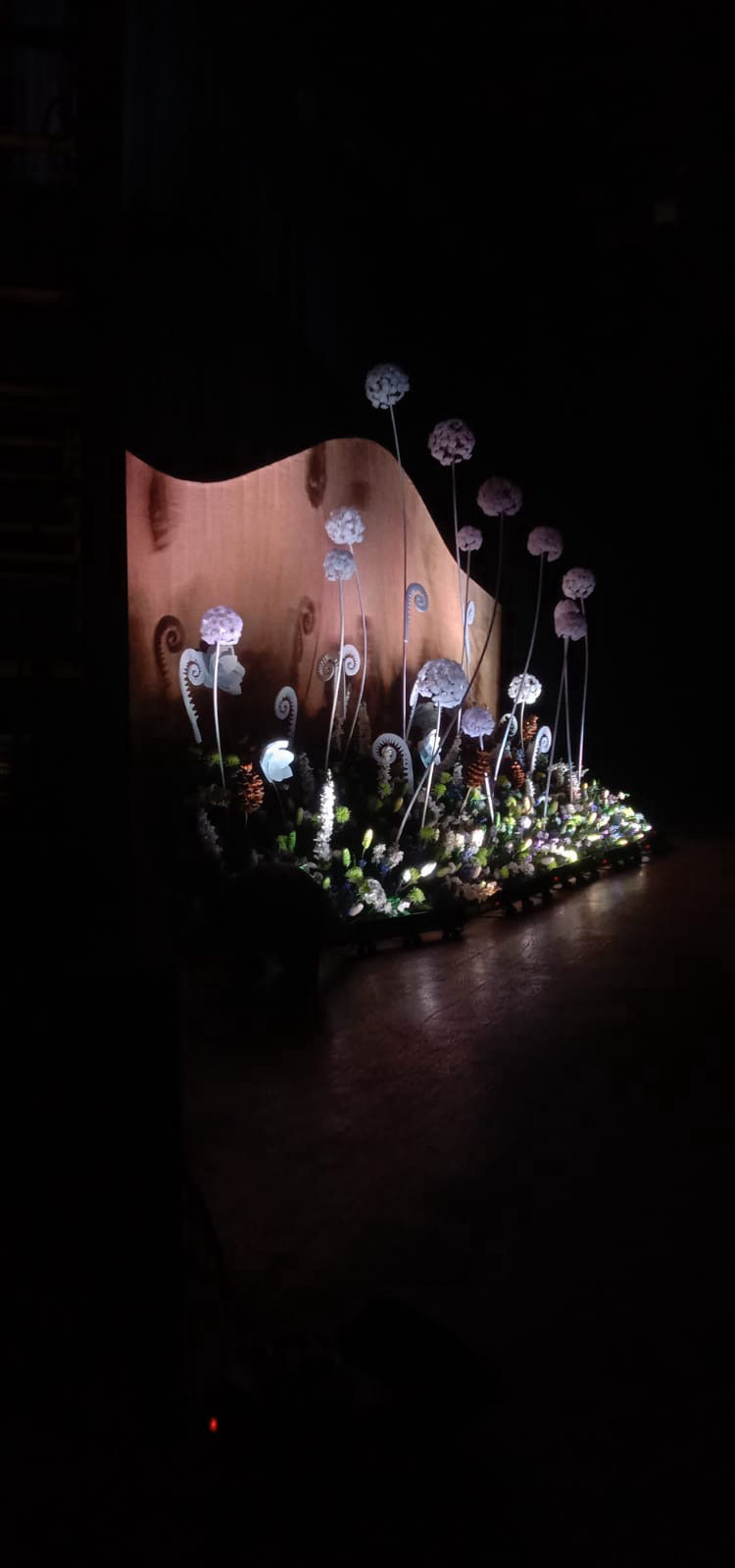 Lit floral stage installation backdrop at InvokED 4.0 education summit