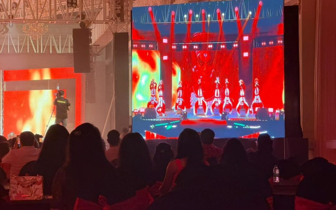 A packed live show with dancers on the LED screen, the industry an event management course should lead you into